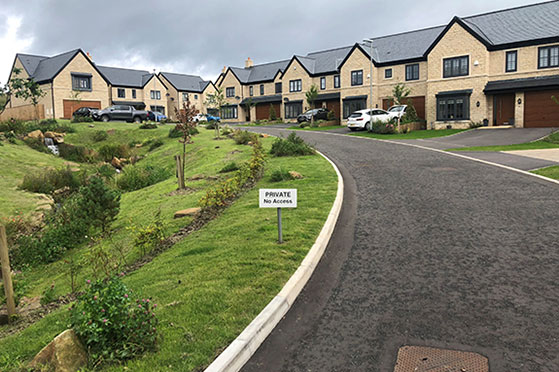 Housing development road surfacing